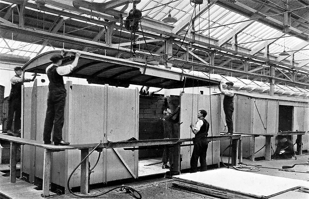 Photo of Lowering Roof on-to Body of Standard 12-ton Covered Goods Wagon.
