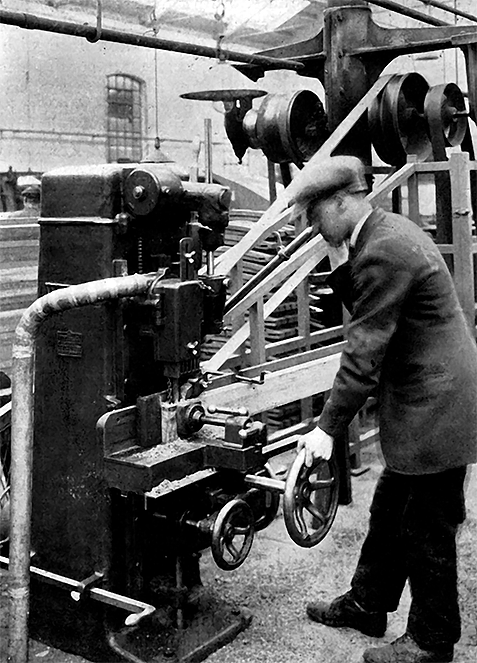 Photo of Wadkin Chain and Hollow Chisel Mortising Machine. Mortising Wagon Timbere by Jig and Mortise Registering Device.